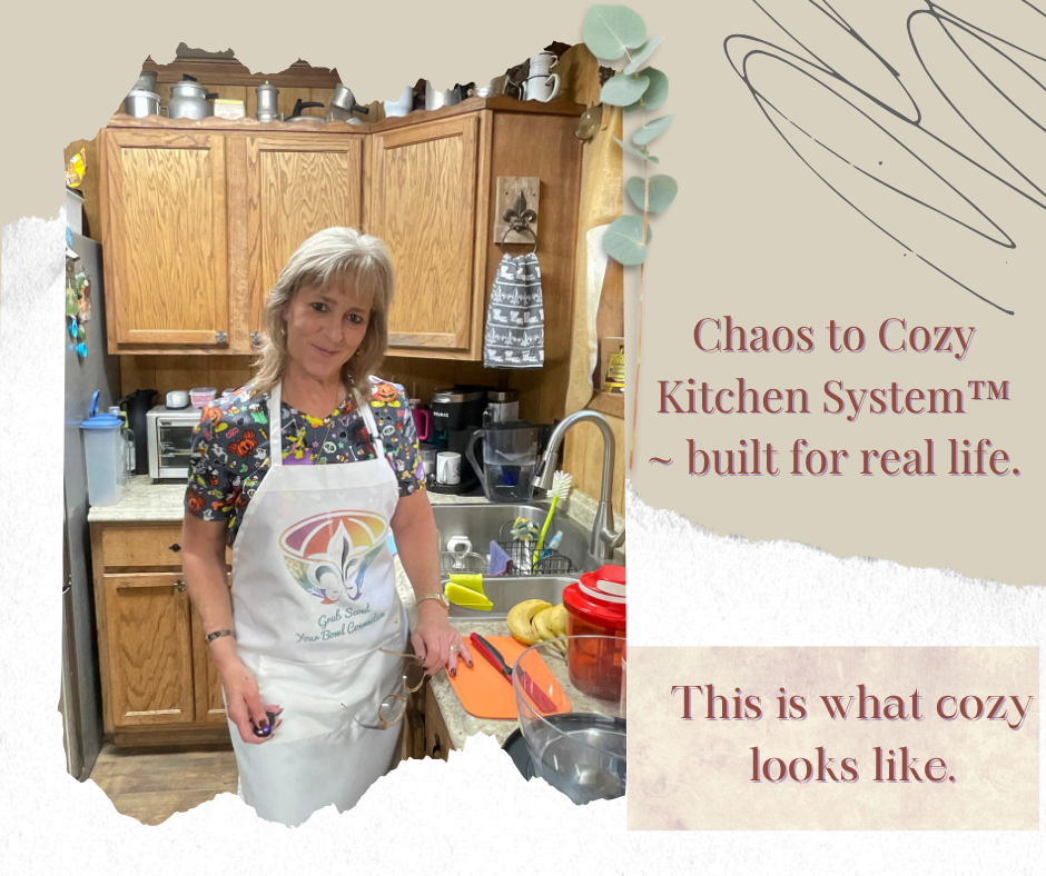 Lisa standing in her warm Cajun kitchen wearing a Grub Scout Your Bowl Connection apron beside Tupperware bowls and utensils, with overlay text reading “Chaos to Cozy Kitchen System™ ~ built for real life” and “This is what cozy looks like,” capturing the calm, lived-in feel of her kitchen system in action.