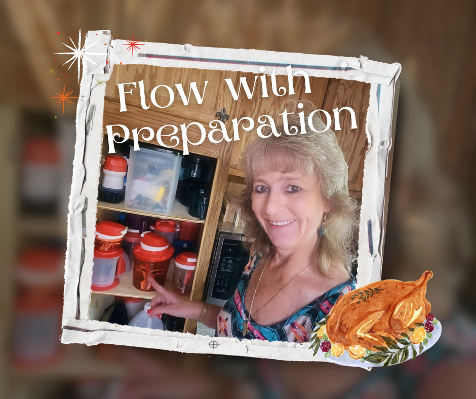 Lisa smiling in her kitchen pointing to neatly stacked orange and red Tupperware containers labeled Flow with Preparation.