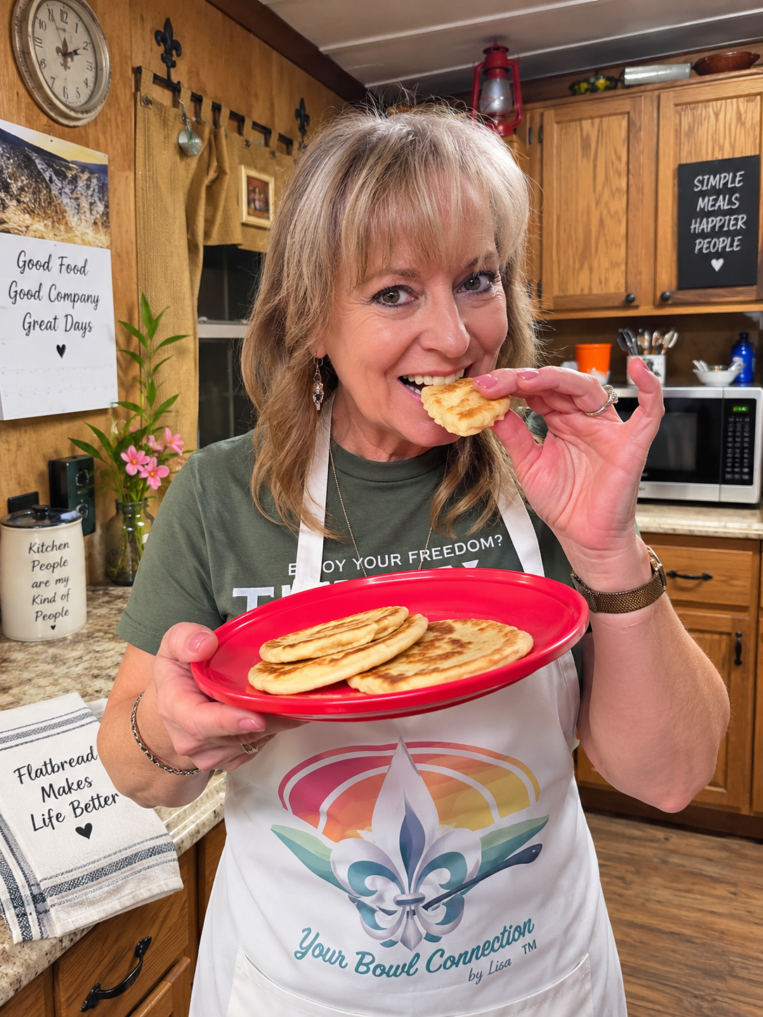 Lisa holding a red plate of homemade 10-minute flatbread and taking a bite in her cozy Louisiana kitchen.